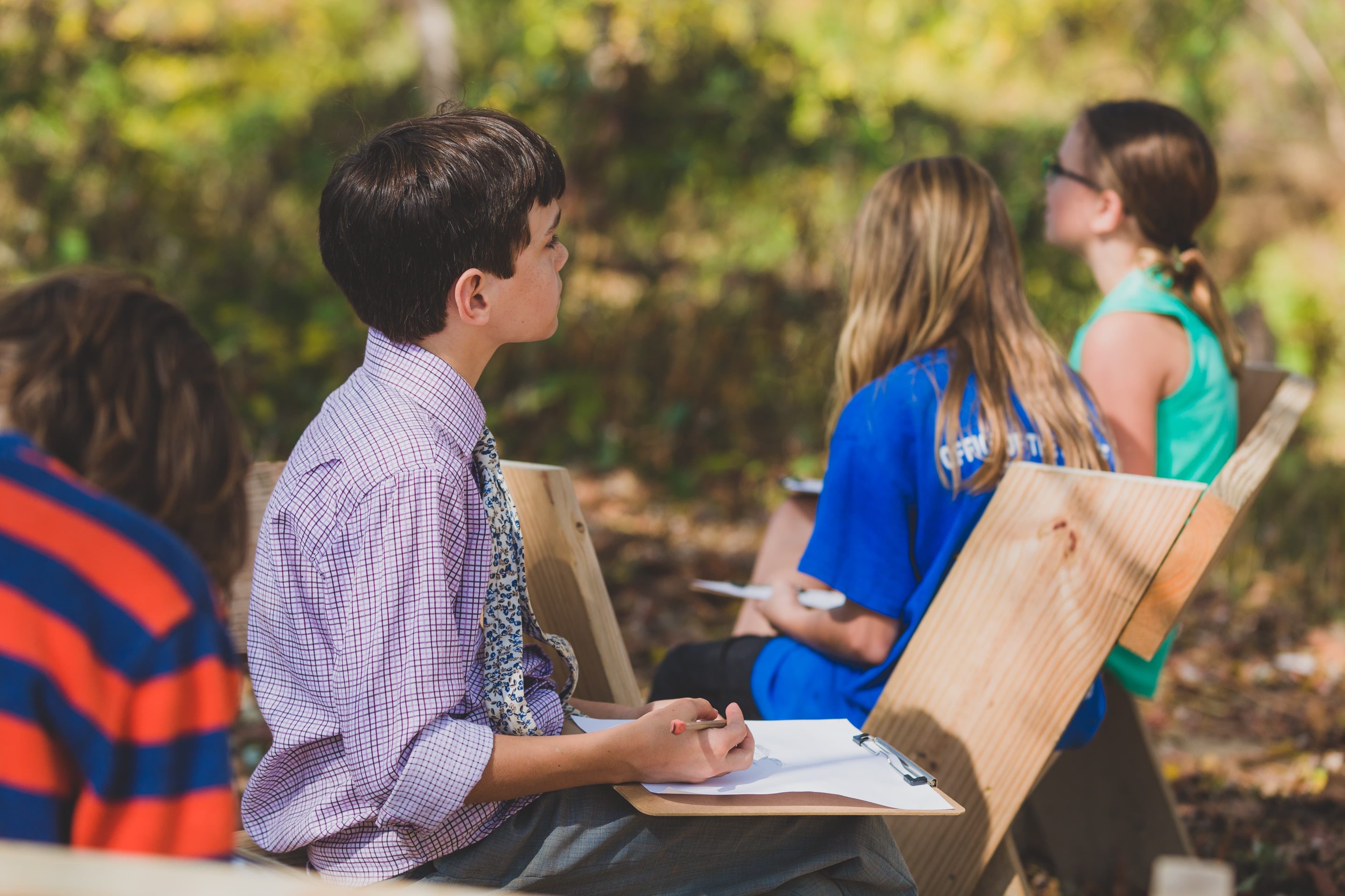 Student studying in nature